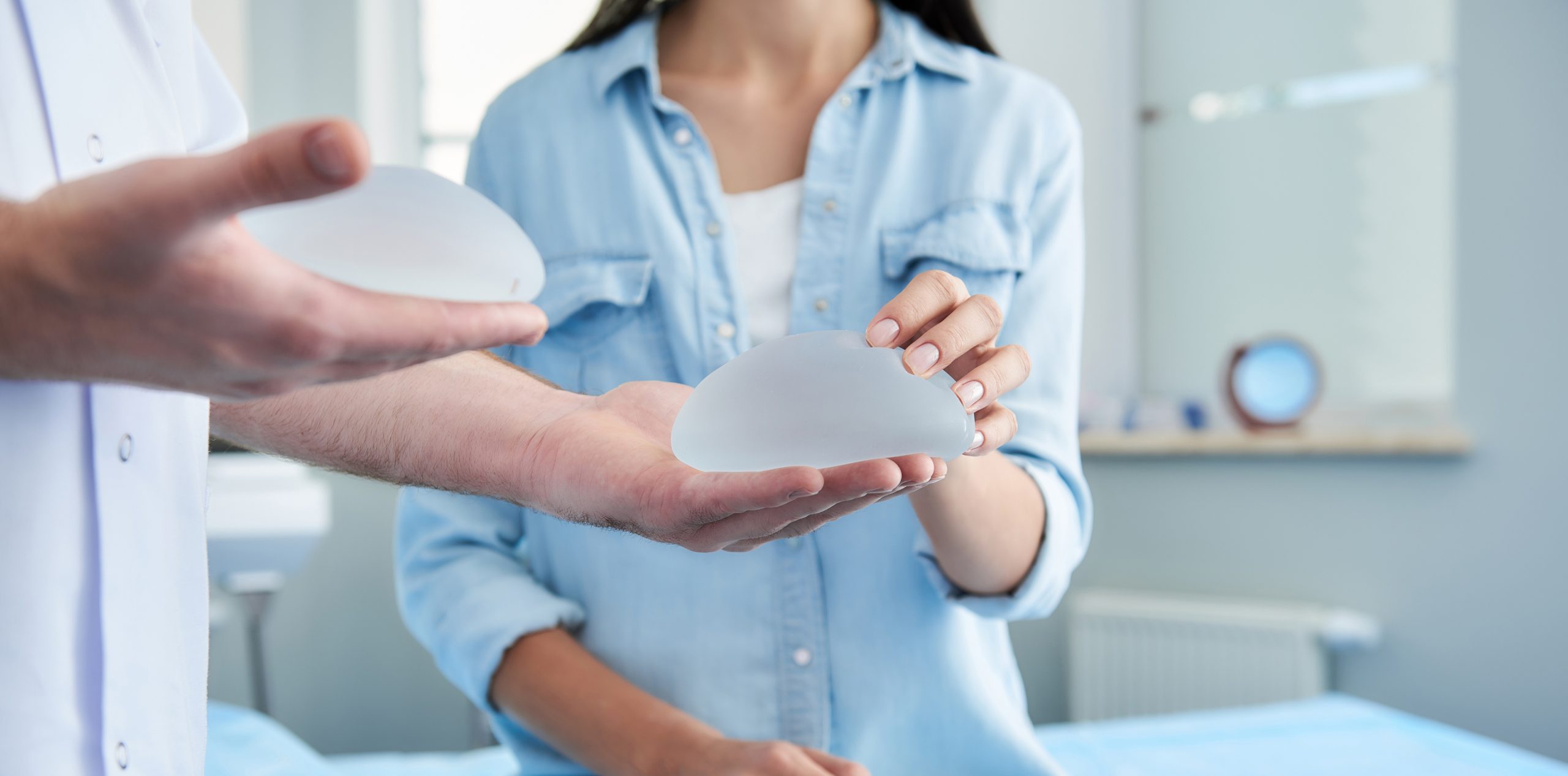 woman making choices for breast augmentation implants