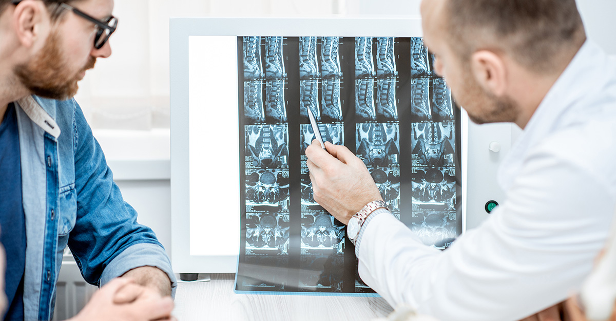 post-laminectomy syndrome patient talking with doctor