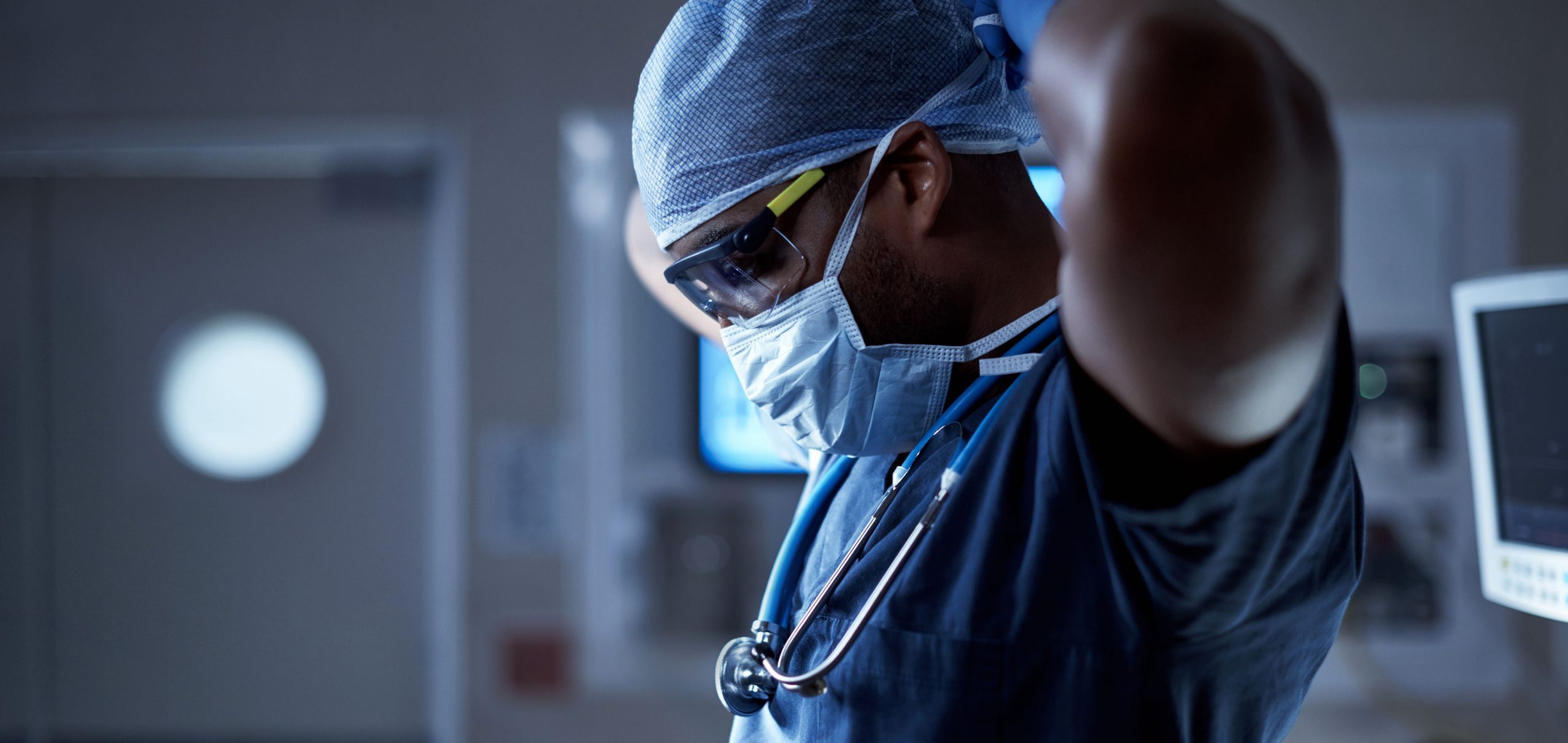 one of our physicians preparing to go into surgery