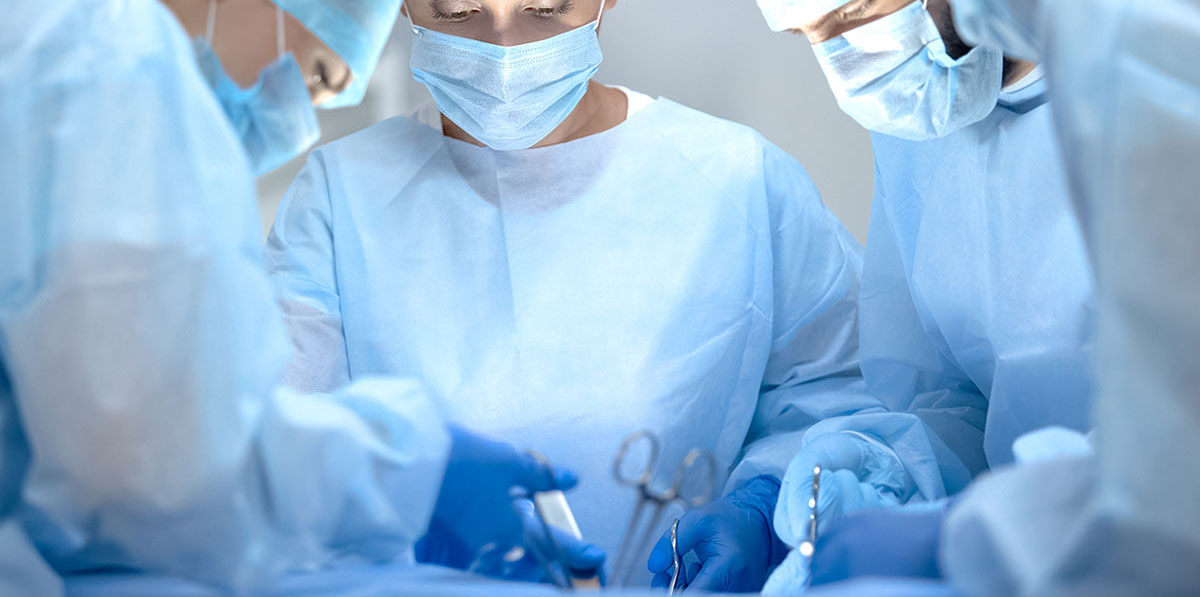 team of surgeons conducting Minimally Invasive Spine Surgery