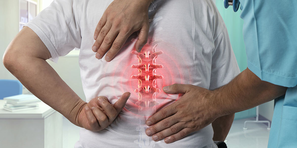 Doctor identifying spine pain